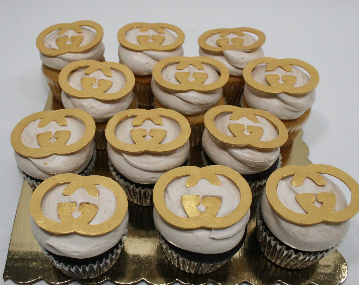 Gold Gucci cupcakes
